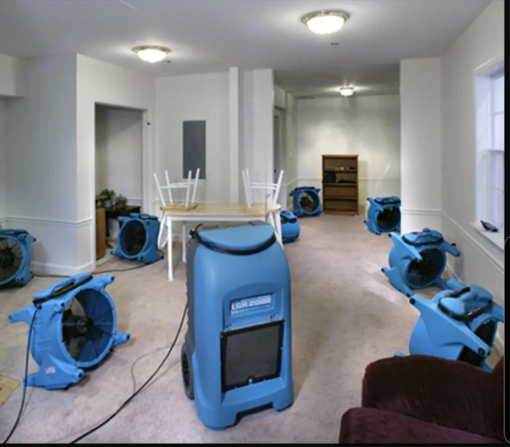 Air movers and dehumidifier setup for Water Damage Restoration in Richland